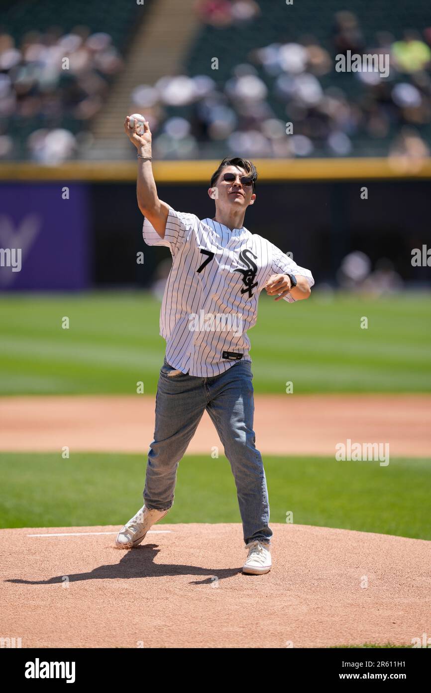 Latin Pop Artist Alex Ponce throws out a ceremonial first pitch before