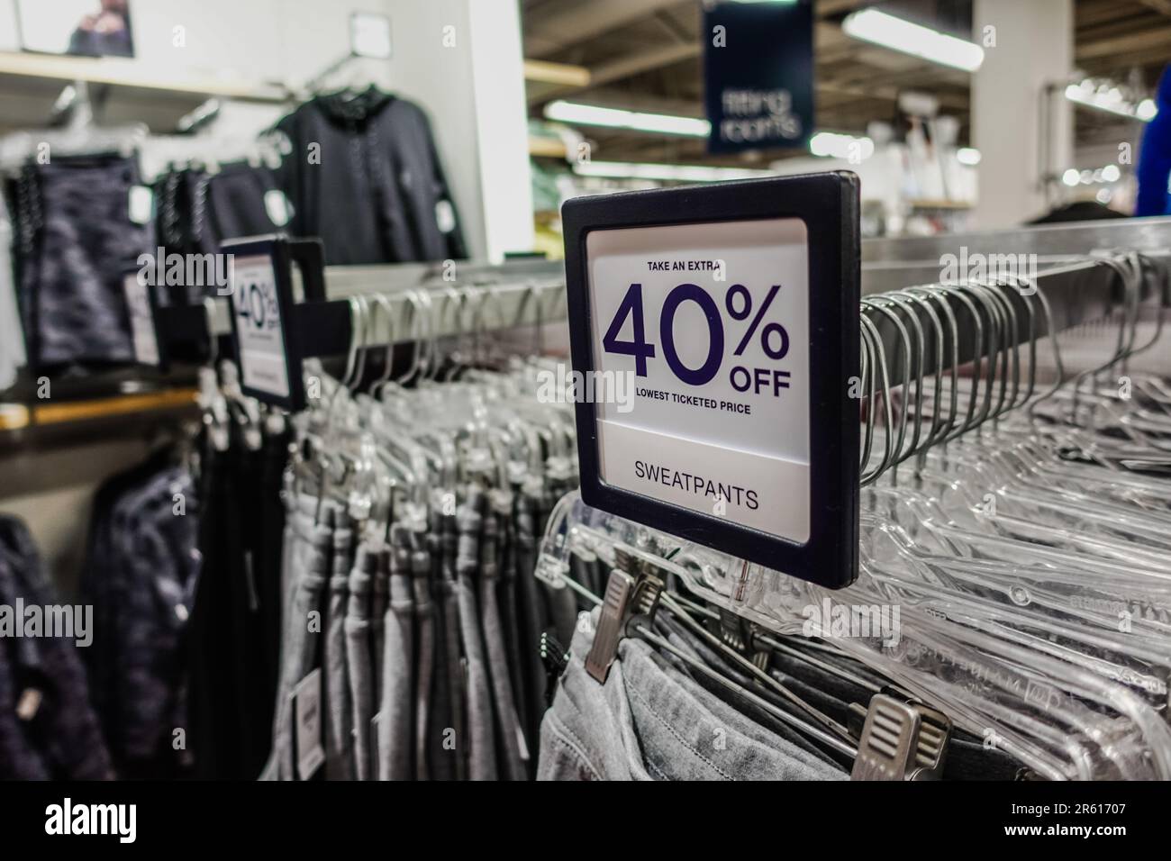40 percent off sign insie a clothing store Stock Photo