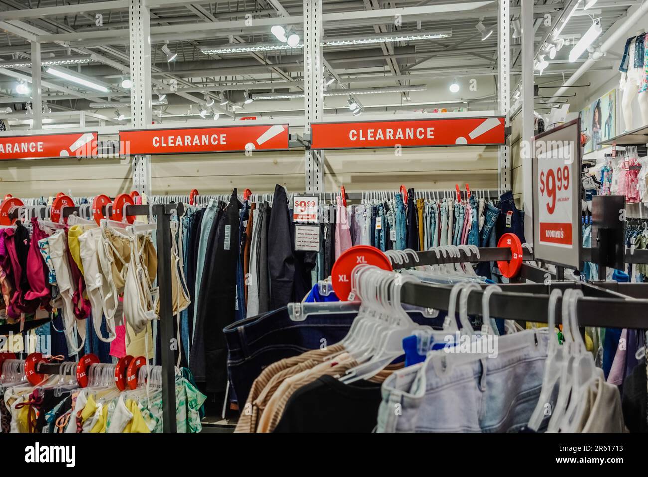 https://c8.alamy.com/comp/2R61713/clearance-section-of-a-clothing-store-2R61713.jpg