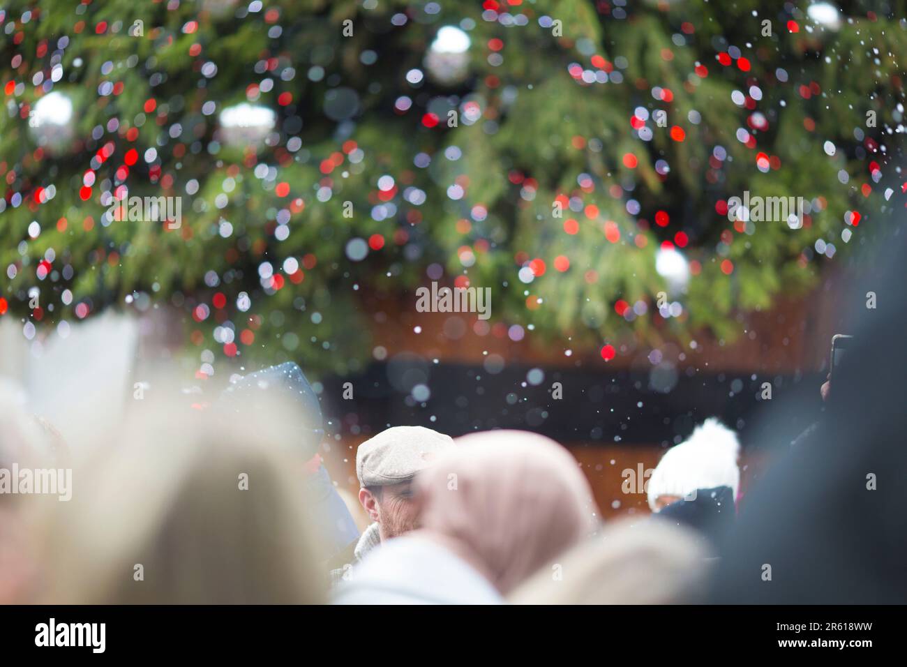 Christmassy decorations and artificial snow flakes are seen in Covent