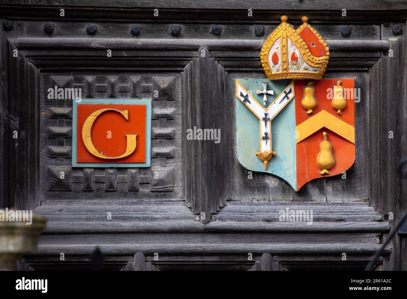 A symbol on the entrance gateway to Abbots Hospital in the town of Guildford in Surrey, UK. Stock Photo