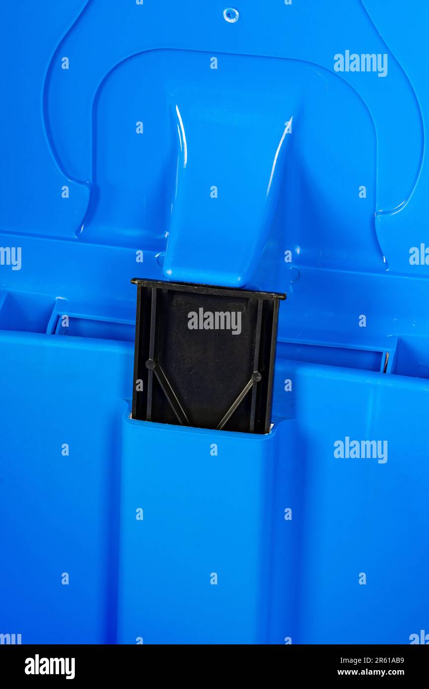 A blue plastic trash bin close up Stock Photo Alamy