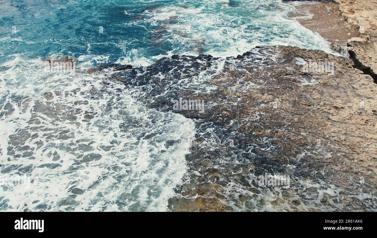 Sea waves crash on the rock Stock Photo - Alamy