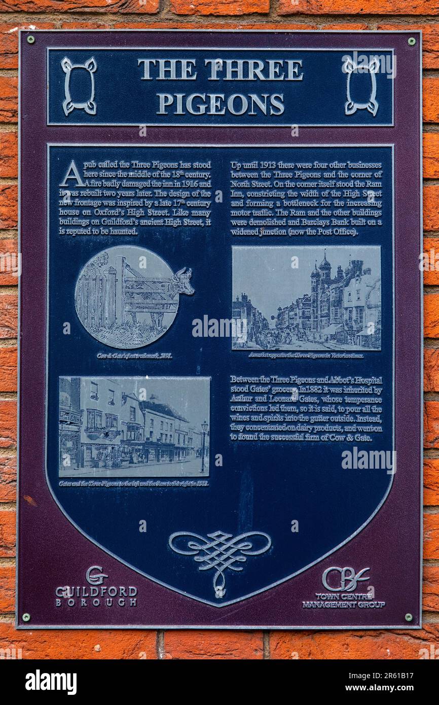 Surrey, UK - April 5th 2023: A plaque on the exterior of The Three Pigeons public house, detailing its history, in the town of Guildford in Surrey, UK Stock Photo