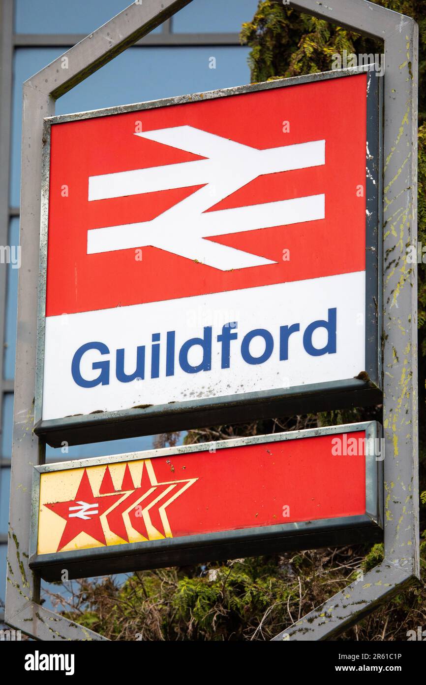 Surrey, UK - April 5th 2023: Close-up of the sign for Guildford Railway Station in the town of Guildford in Surrey, UK. Stock Photo