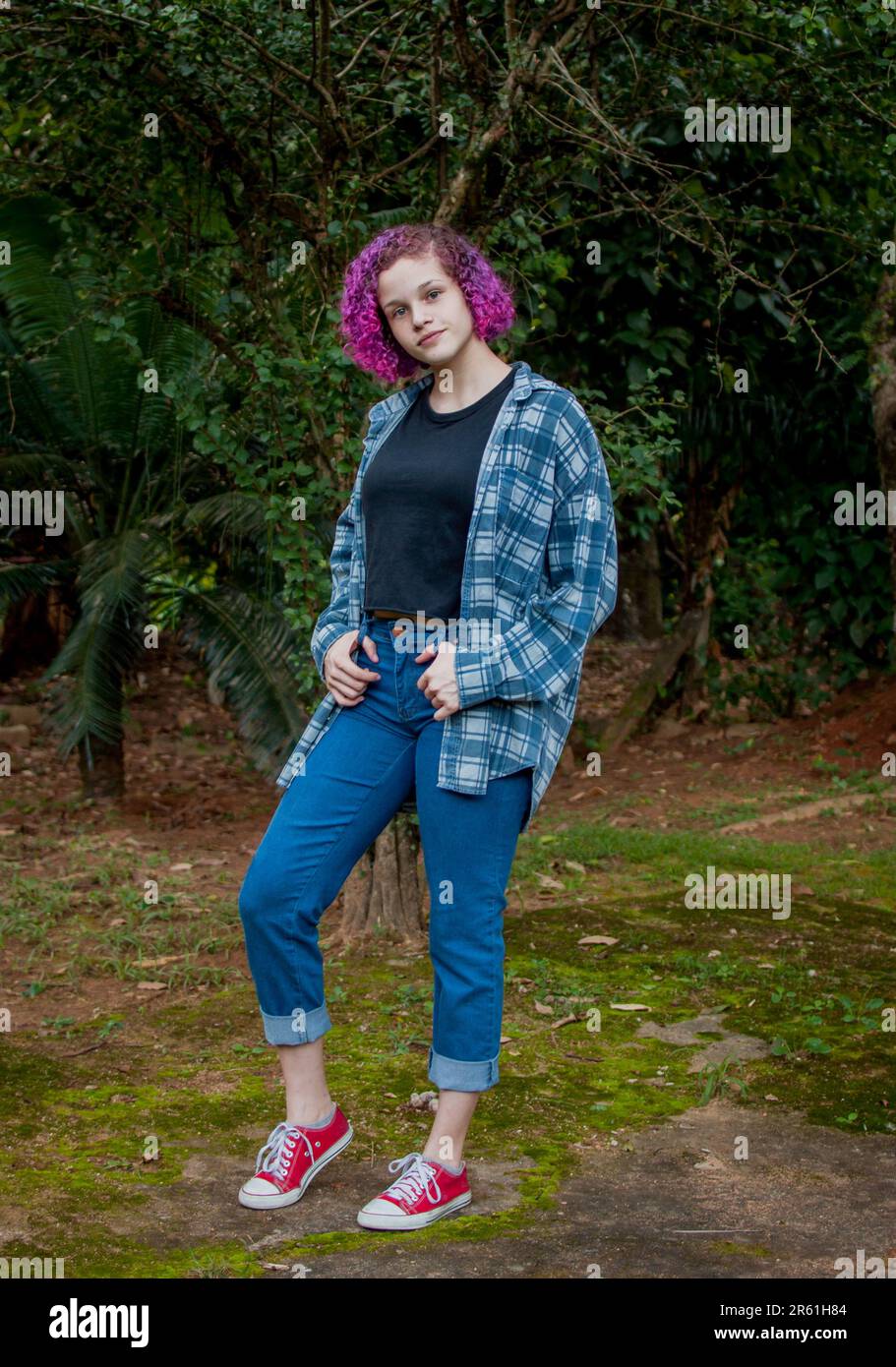 Young woman with colored hair outdoors Stock Photo