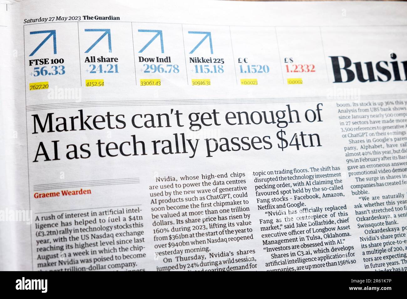 'Markets can't get enough of AI as tech rally passes $4tn' Guardian newspaper headline artificial intelligence technology article May 2023 London UK Stock Photo