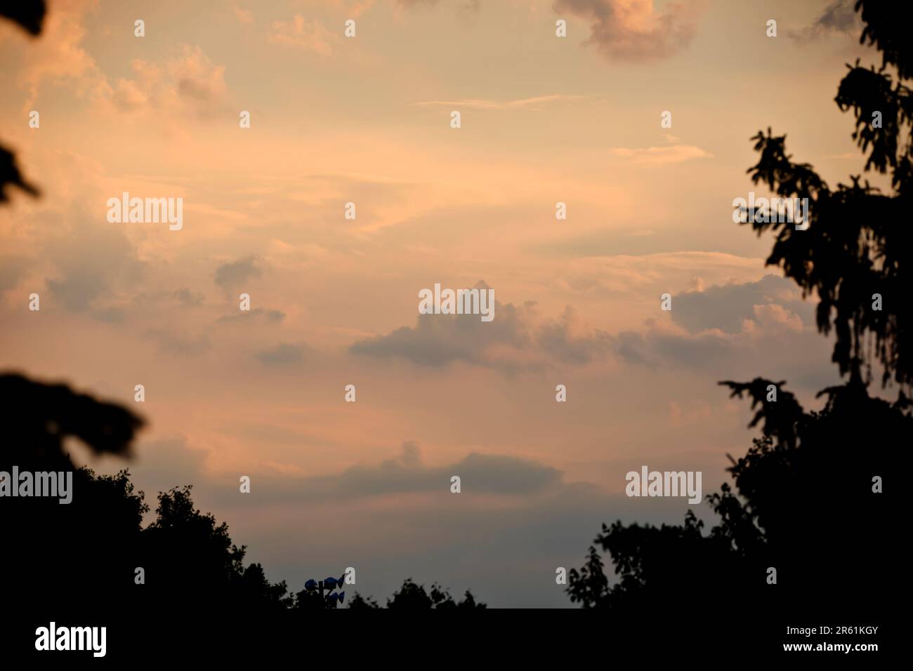 Beautiful cloudscpe with muted tones during sunset on a spring evening in Iowa. Stock Photo