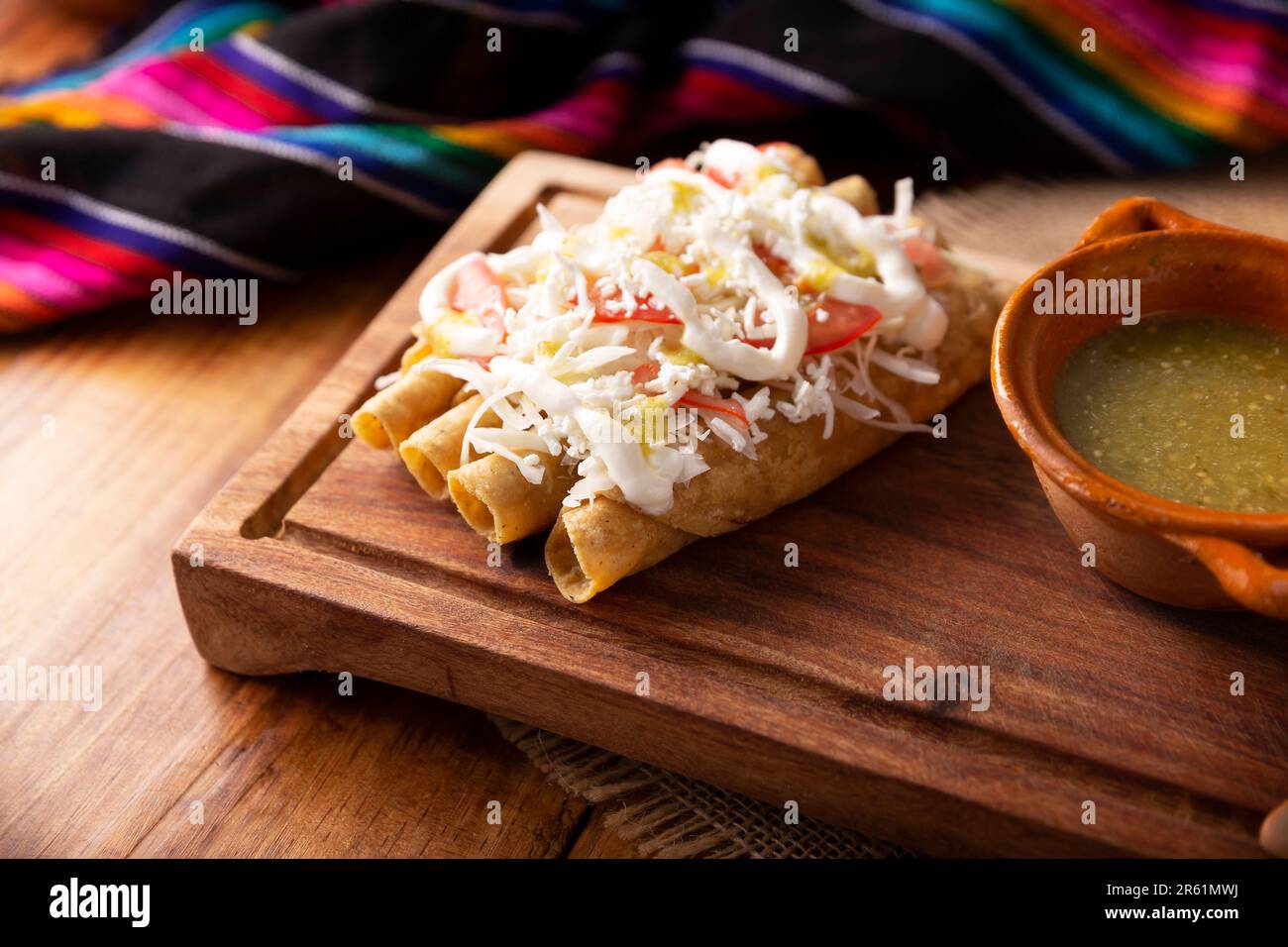 Tacos Dorados. Mexican dish also known as Flautas, consists of a rolled corn tortilla with some