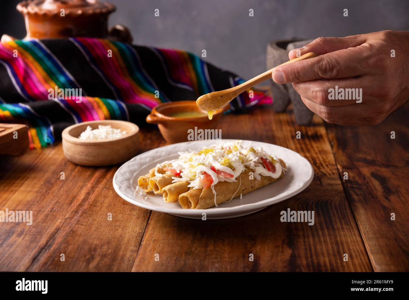 Tacos Dorados. Mexican dish also known as Flautas, consists of a rolled