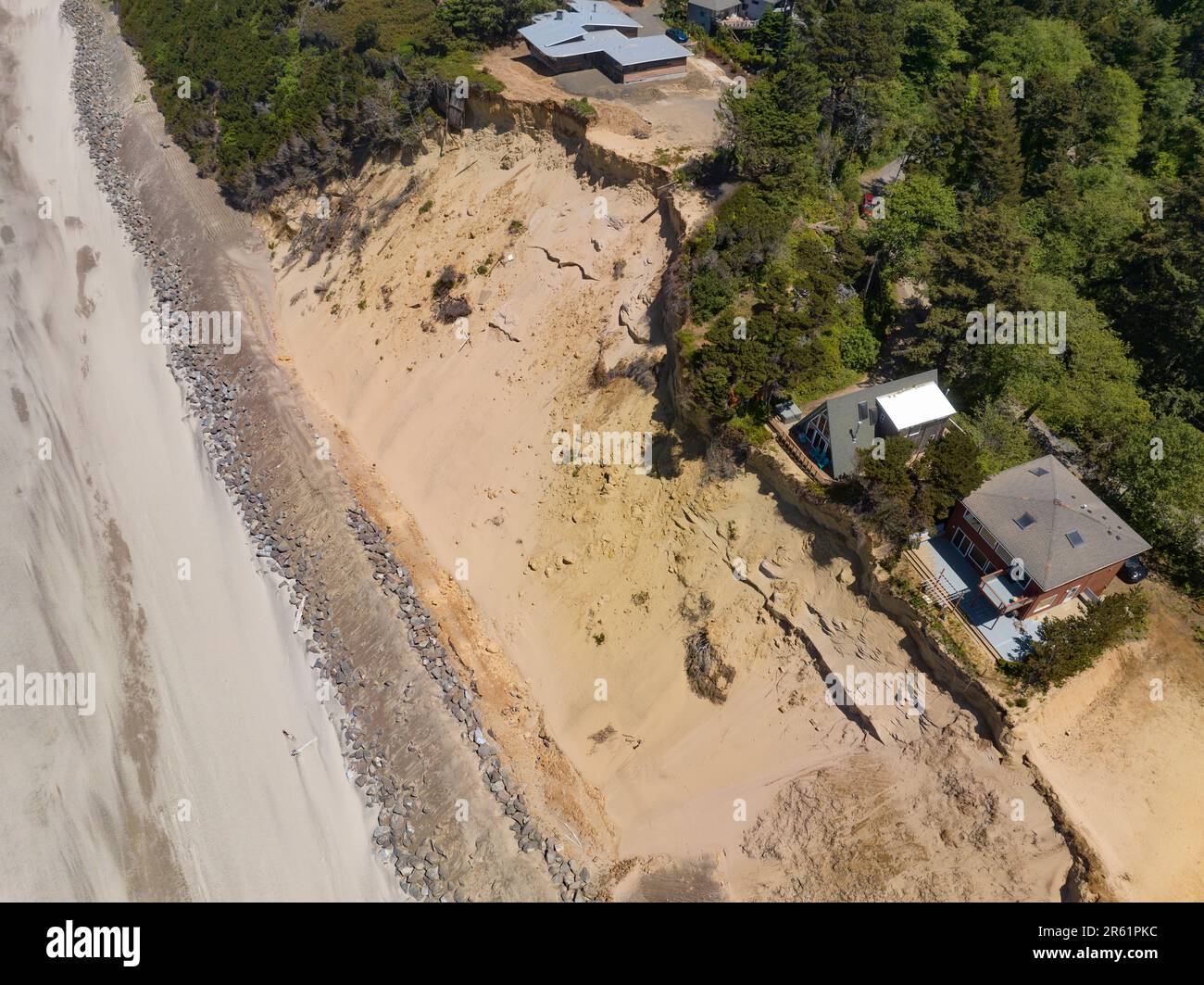 Only a slide of sand remains after beachfront homes were destroyed with