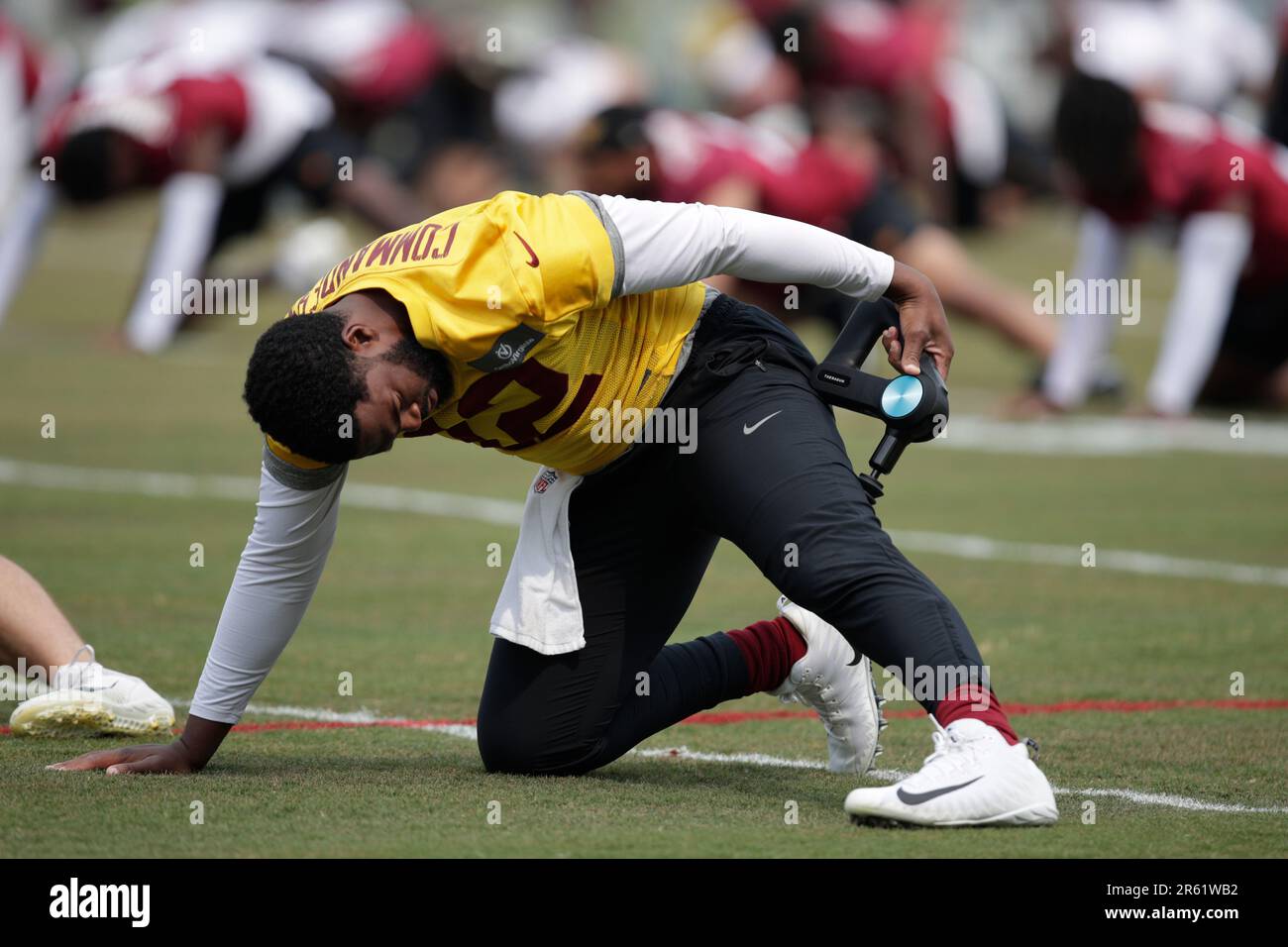 Washington Commanders quarterback Jacoby Brissett uses a message gun ...