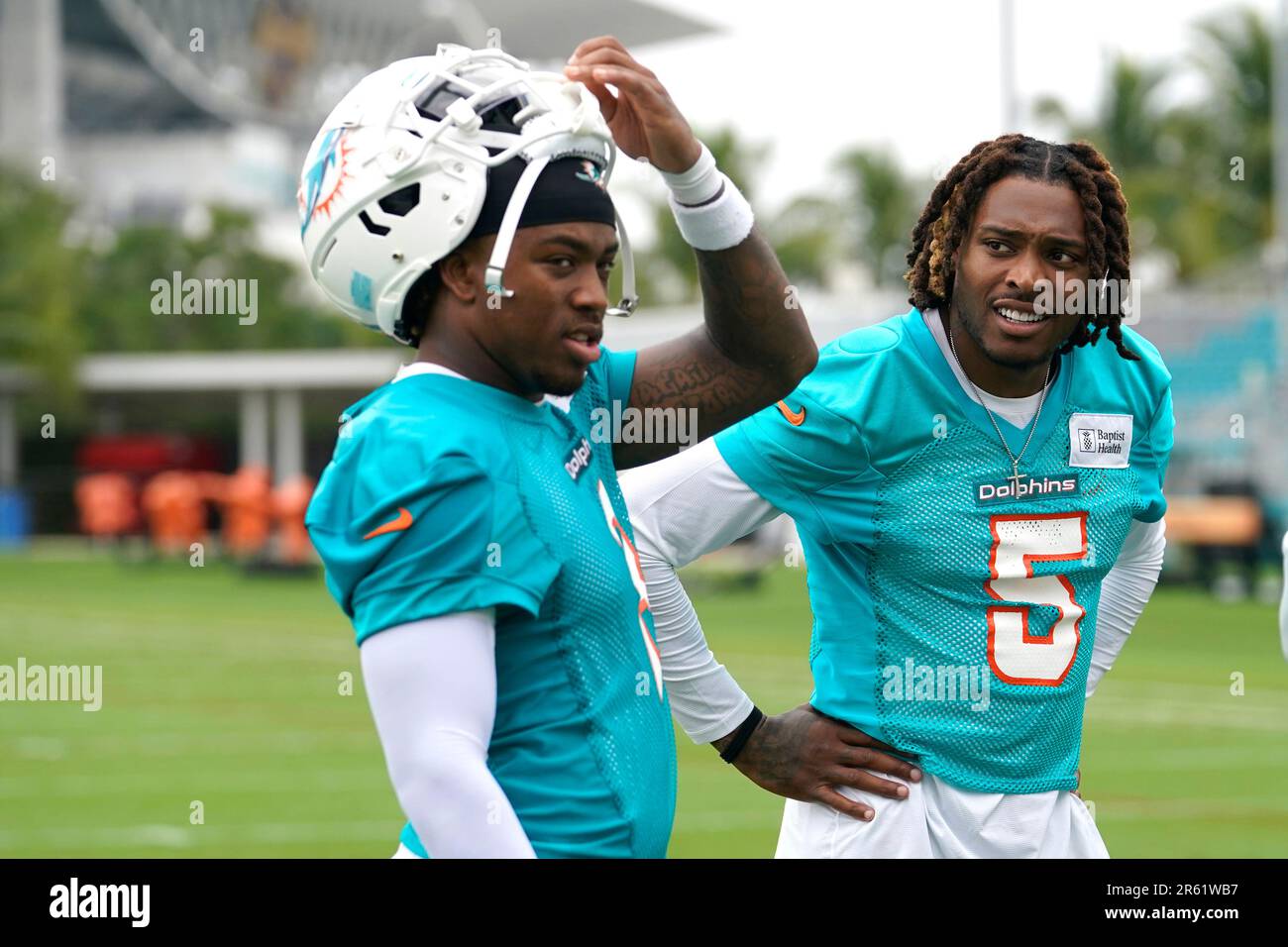 Miami Dolphins safety Jevon Holland, left, and cornerback Jalen Ramsey (5)  talks with the news media after practice at the NFL football team's  training facility, Tuesday, June 6, 2023, in Miami Gardens,
