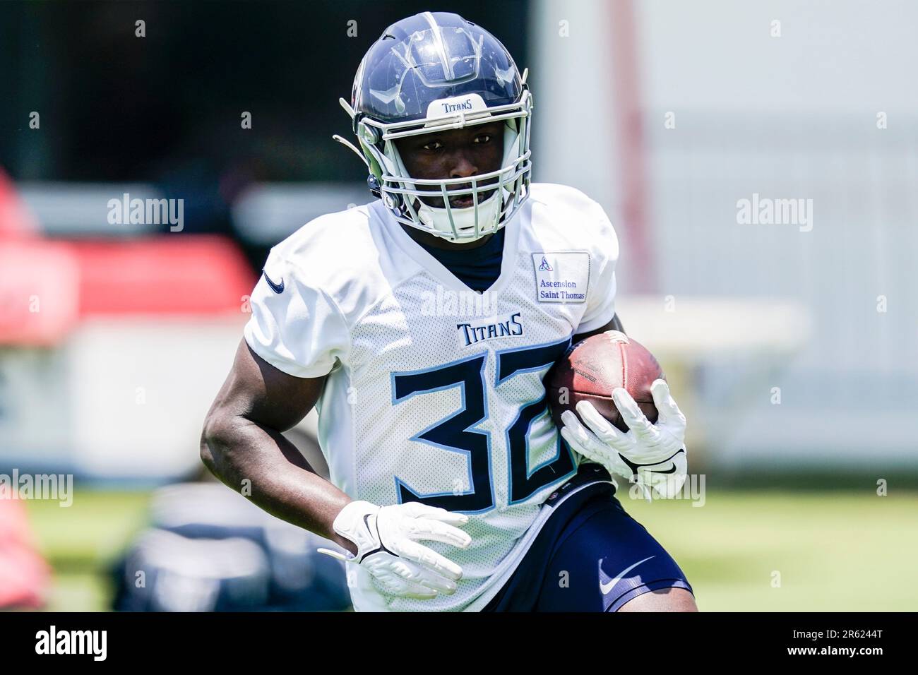 Tennessee Titans running back Tyjae Spears (32) runs up the field