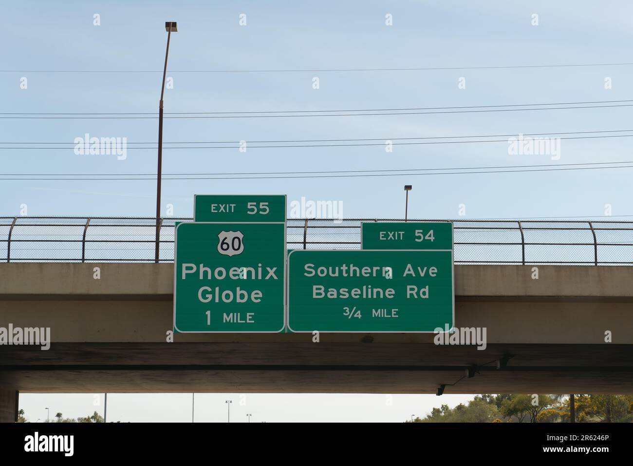 Signs on AZ 101 Loop for Exit 55 US 60 toward Phoenix and Globe, and Exit 54 for Southern Ave and Baseline Rd Stock Photo