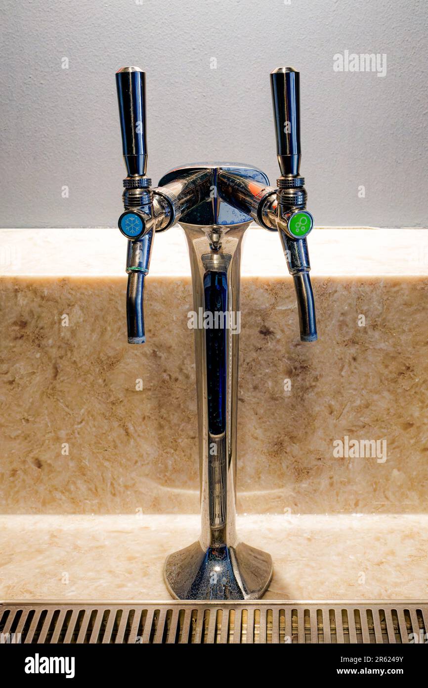countertop water dispenser with still and sparkling taps Stock Photo