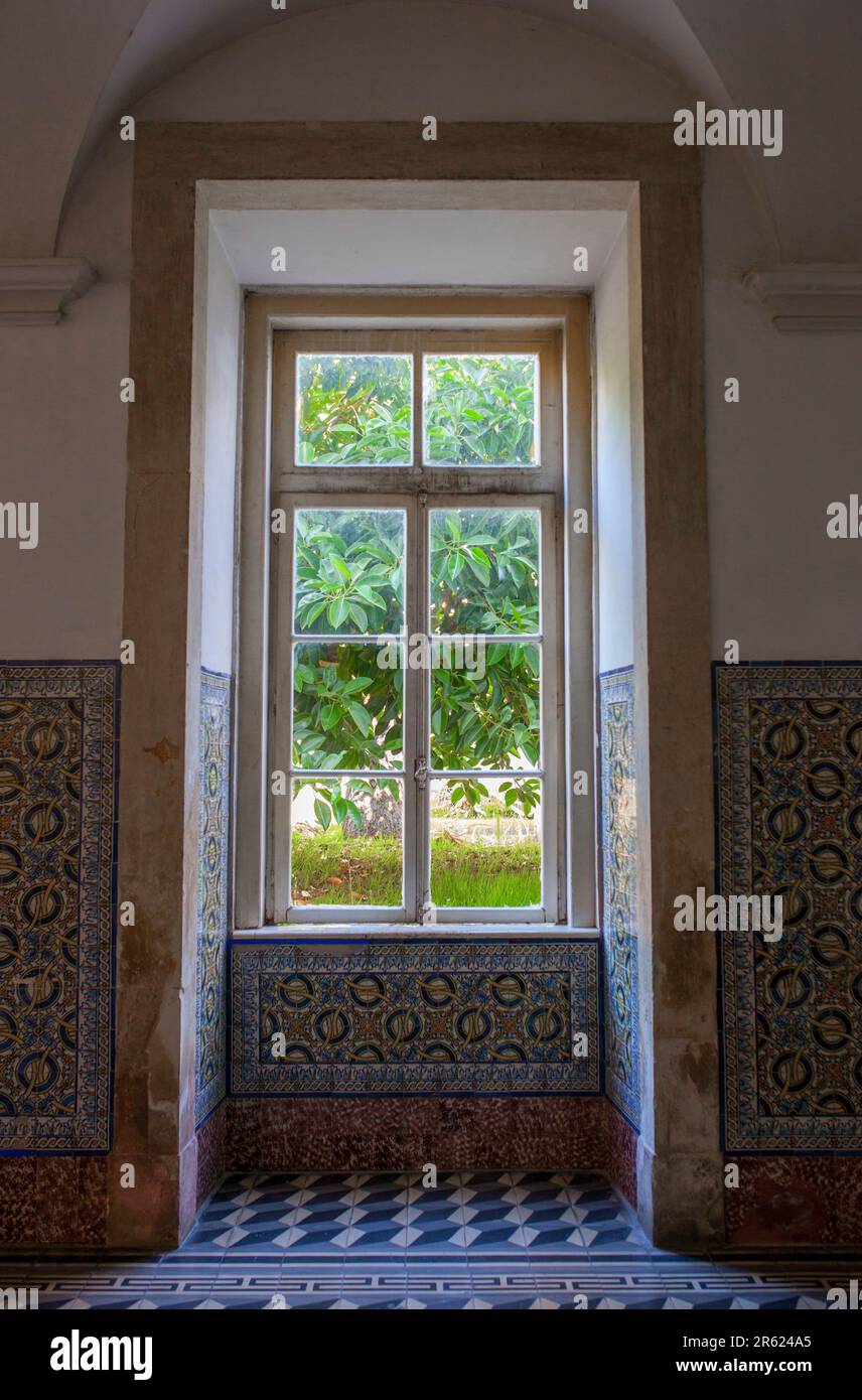 Coimbra, Portugal - Sept 6th 2019: Colorful glazed tile plinth. University of Coimbra. Building indoors view Stock Photo