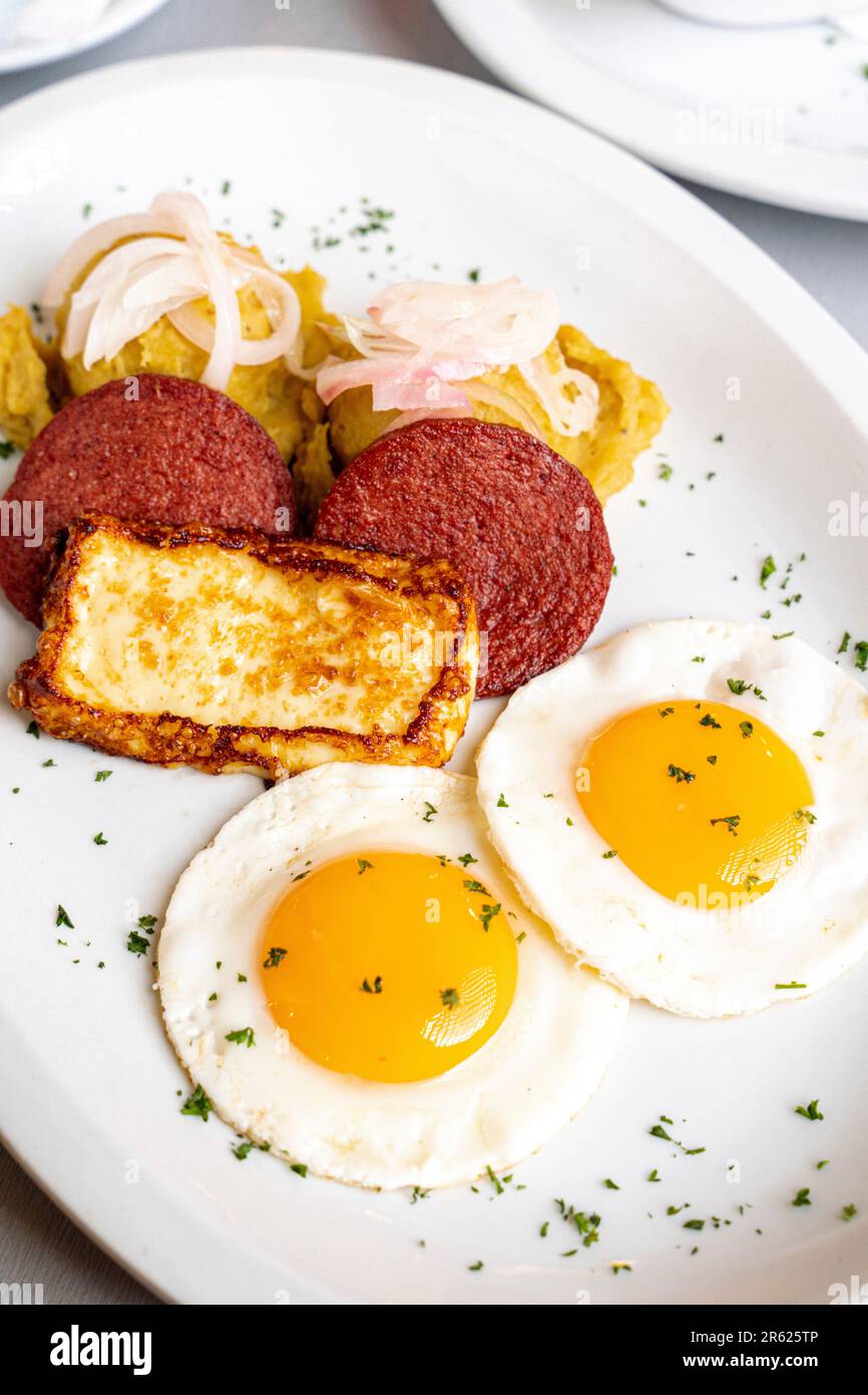 A closeup photograph of a traditional Dominican Mangu breakfast