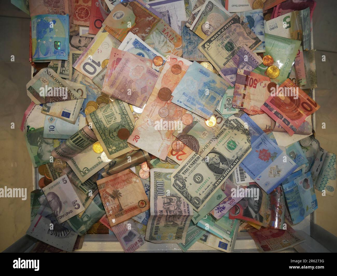Banknotes and coins of various countries Stock Photo - Alamy