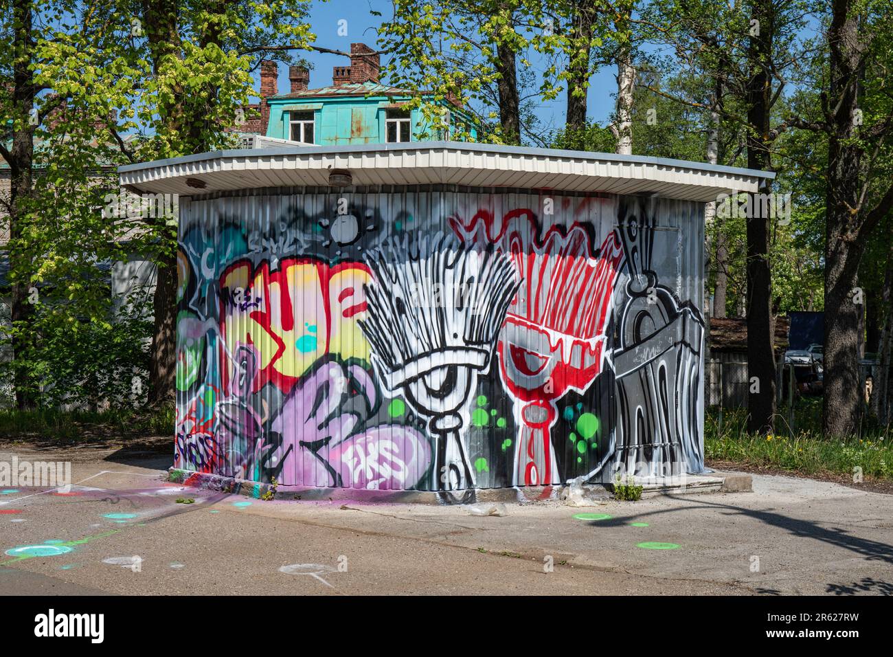 Street art. Graffiti-covered old kiosk in Kopli district of Tallinn, Estonia Stock Photo