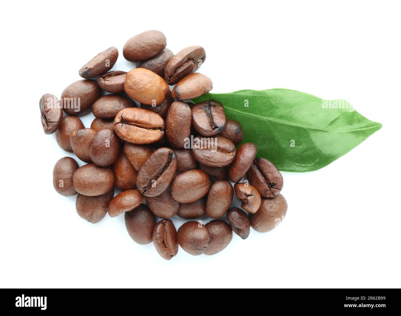 Heap of coffee beans and leaf on white background Stock Photo - Alamy