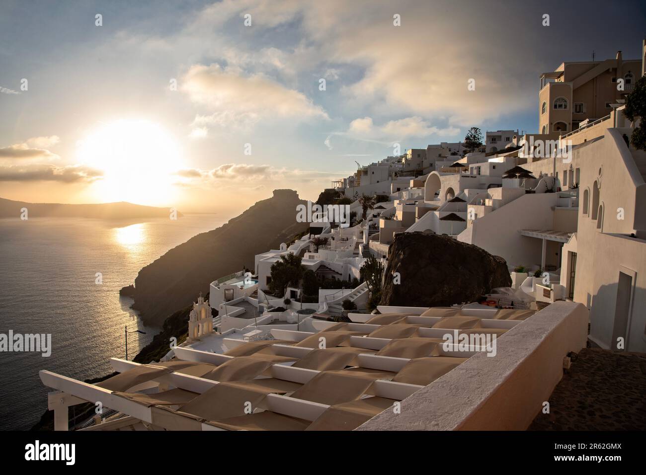 Sunset at Firostefani overlooking the Agean Sea in Santorini, Greece. Stock Photo