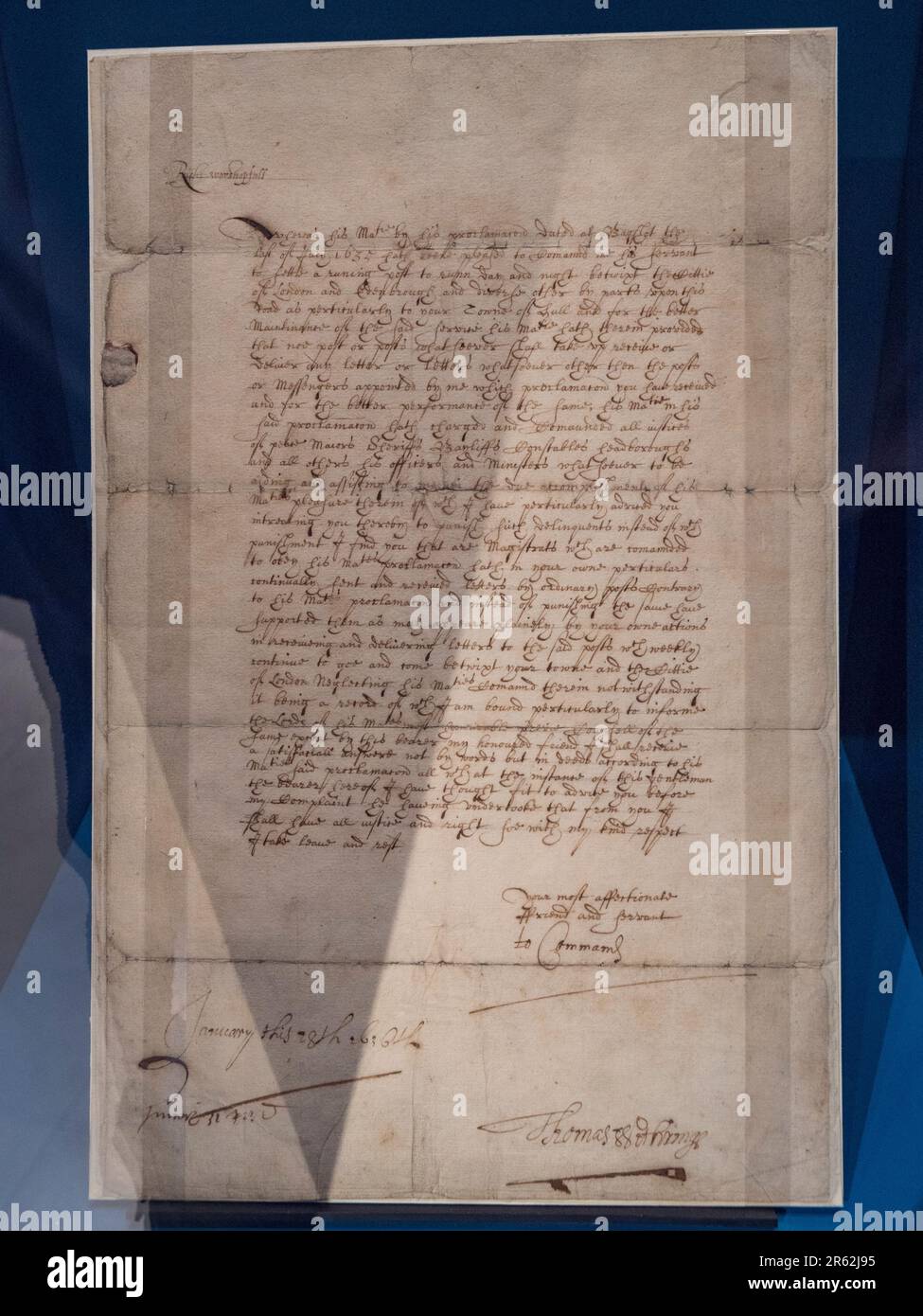 Letter relating to the setting up of the postal service (1636) on display in the Postal Museum in London, UK. Stock Photo