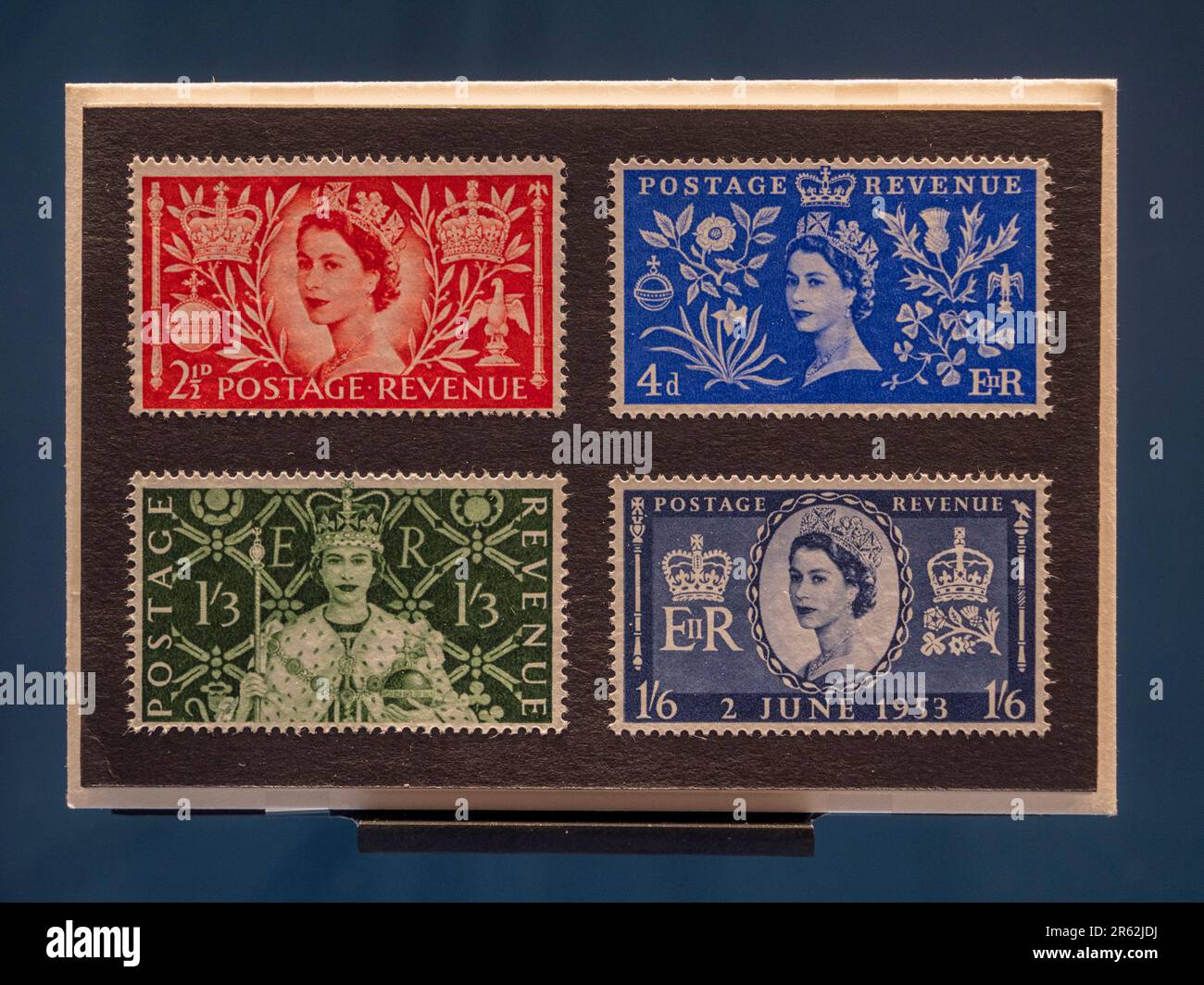 Coronation stamps for Queen Elizabeth II on display in the Postal Museum in London, UK. Stock Photo