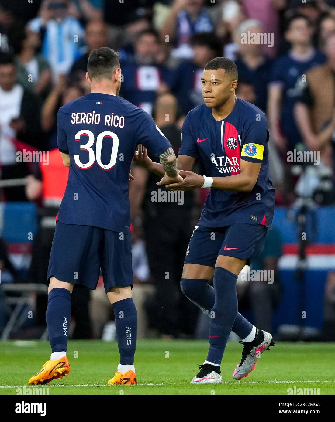 Kylian Mbappe celebrates his goal with Lionel Messi of PSG during the Ligue 1 match between Paris Saint Germain and Clermont Foot at Parc des Princes, Stock Photo