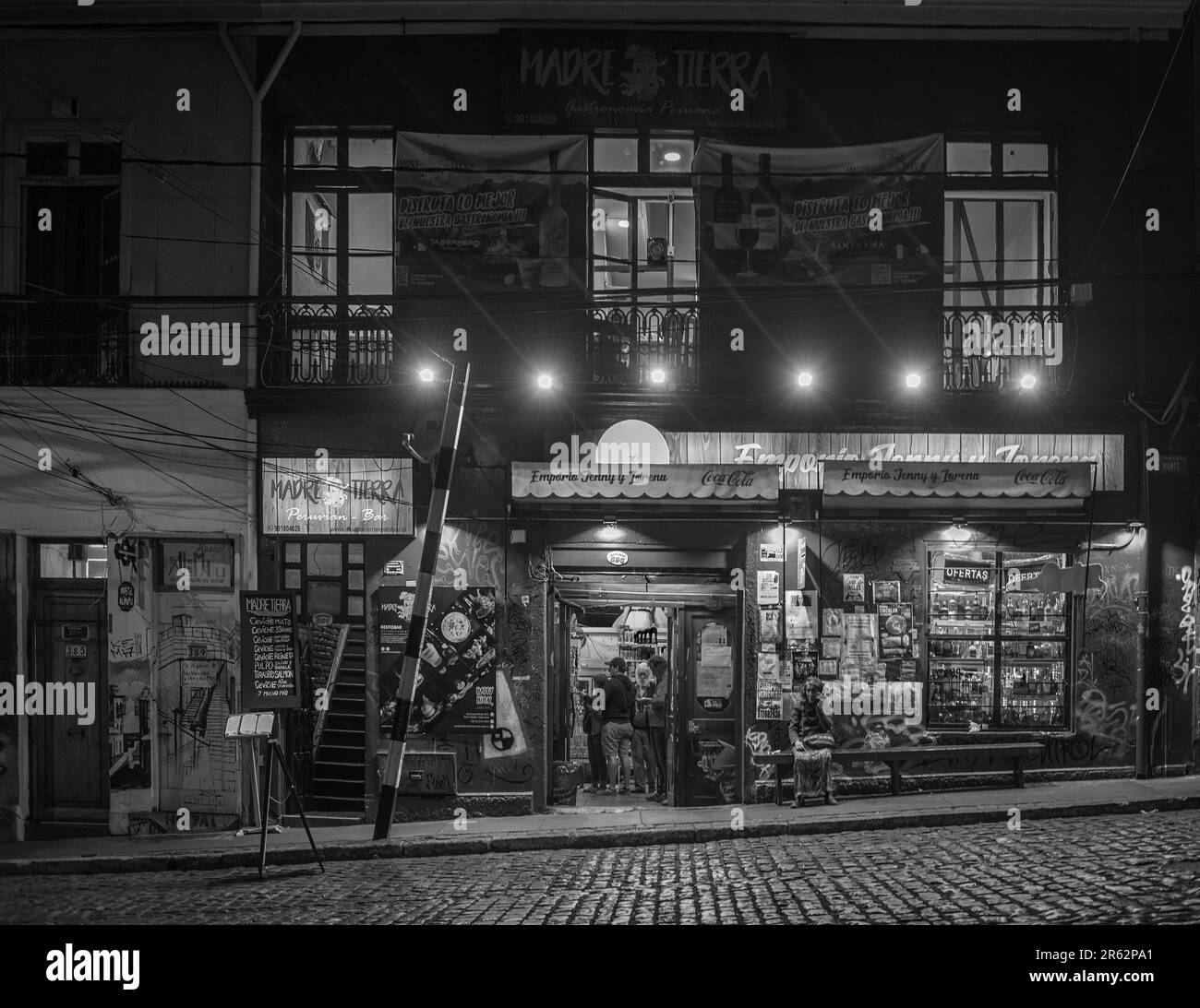 Grocery store at night in the old town of Valparaiso, Chile Stock Photo