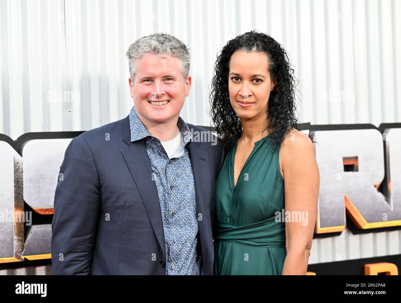 Hasbro CEO Chris Cocks, left, and wife attend the premiere of "Transformers: Rise of the Beasts