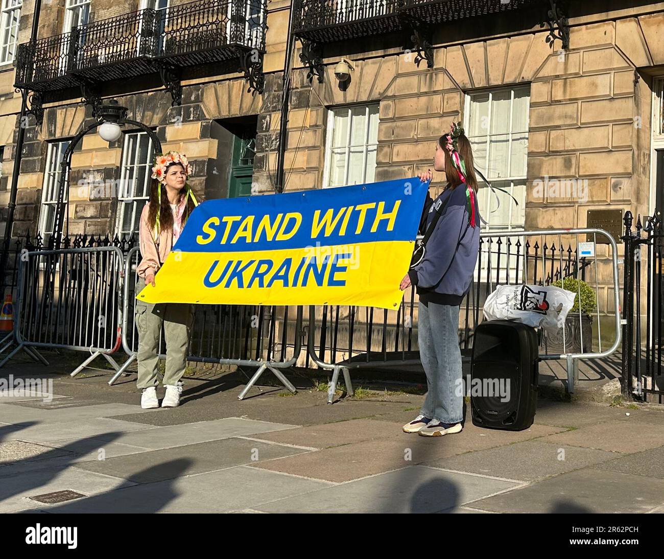 Protestors outside the Russian consulate in Edinburgh, where they decried Russia as a "terrorist state". Ukrainians demanding Vladimir Putin's forces leave their homeland left messages on paper boats for consulate staff to read after a major dam was damaged. Picture date: Tuesday June 6, 2023. Stock Photo
