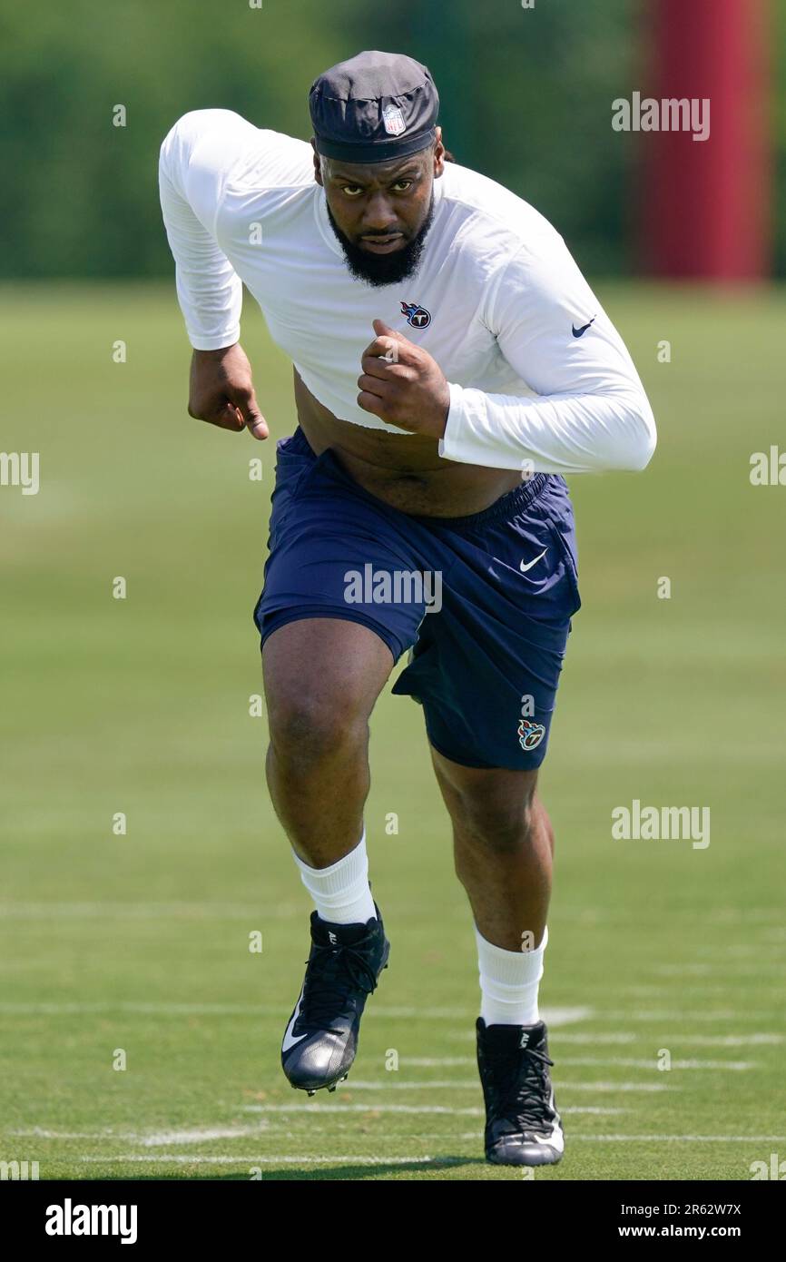 Tennessee Titans defensive lineman Denico Autry runs across the field ...