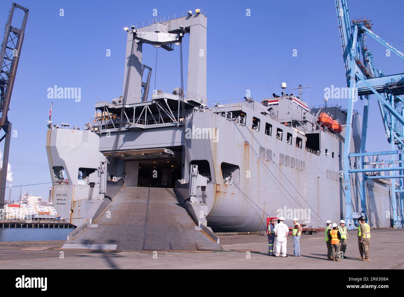 The 833rd transportation battalion loads military equipment onto the ...