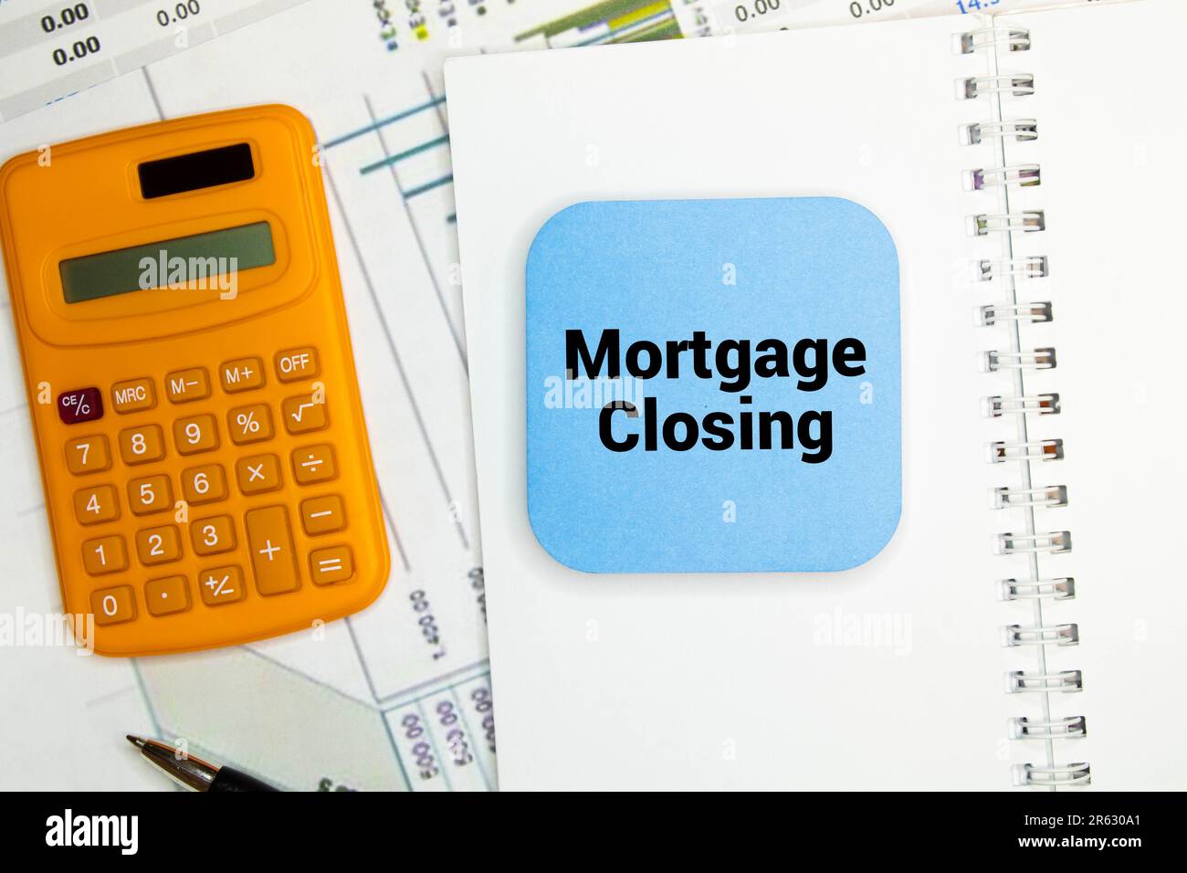 Mortgage Closing is shown using a text. Stock Photo