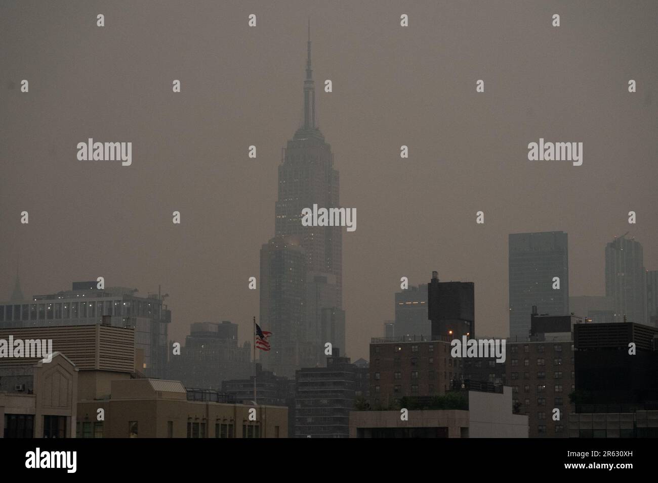 New York, New York, USA. 6th June, 2023. The Empire State Building is obscured by smoke from Canadian wildfires hanging over New York, prompting concerns about air quality on June 6, 2023 in New York. (Credit Image: © Bryan Smith/ZUMA Press Wire) EDITORIAL USAGE ONLY! Not for Commercial USAGE! Stock Photo