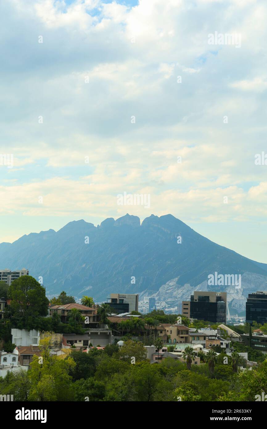 Beautiful landscape with city and green mountains Stock Photo