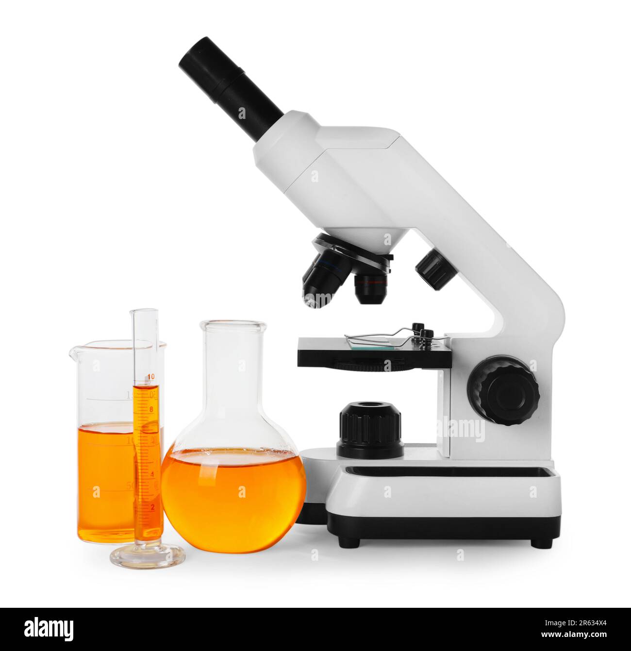 All Orange Microscope Laboratory glassware with orange liquid and microscope isolated on ...