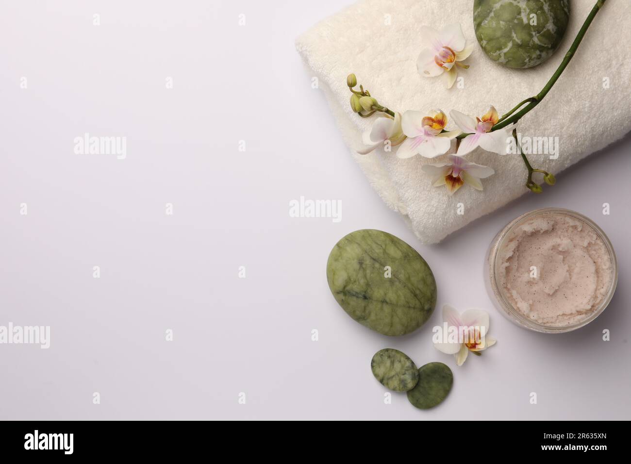 Flat lay composition with different spa products on white background ...