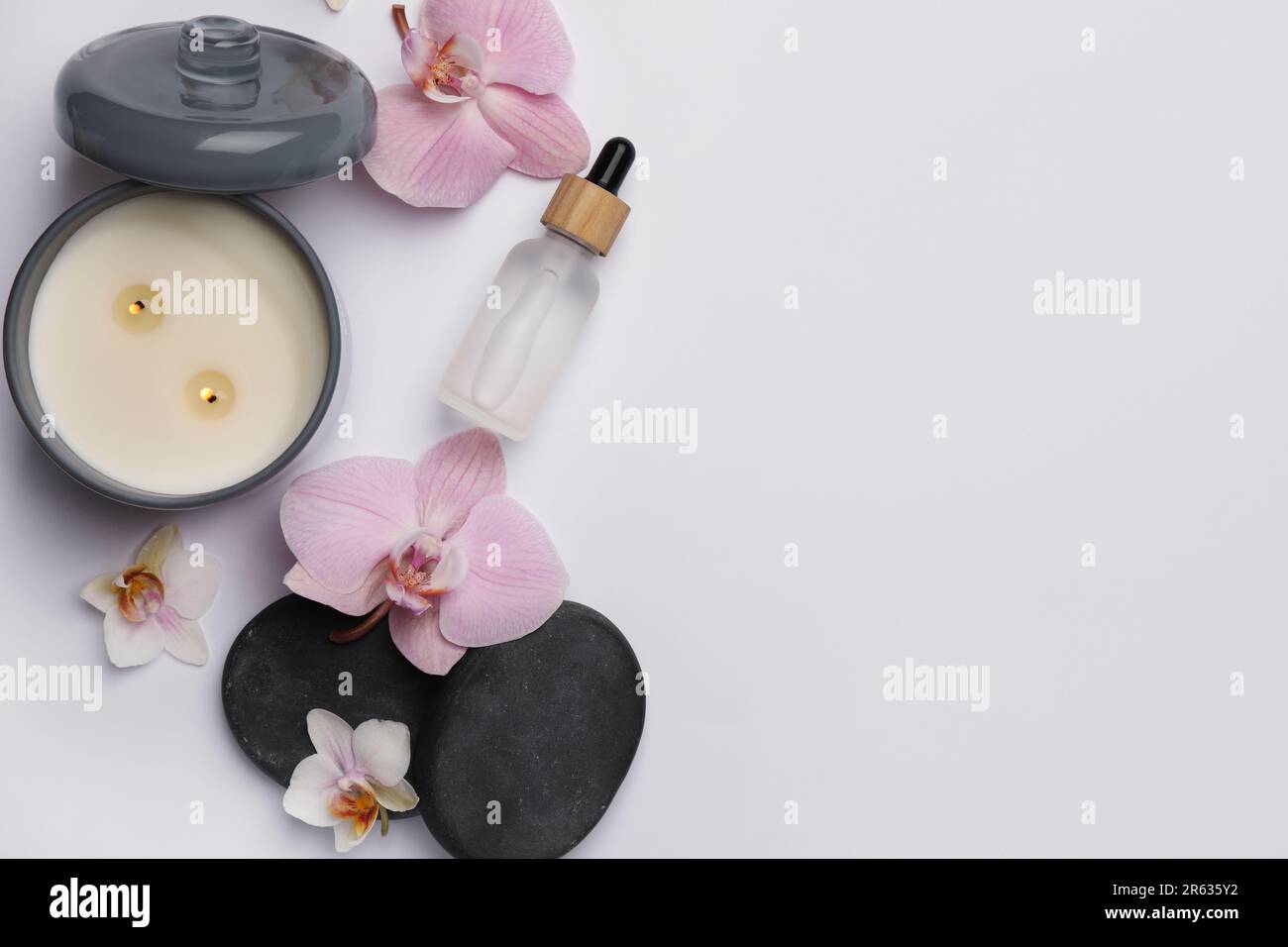 Flat lay composition with different spa products on white background ...
