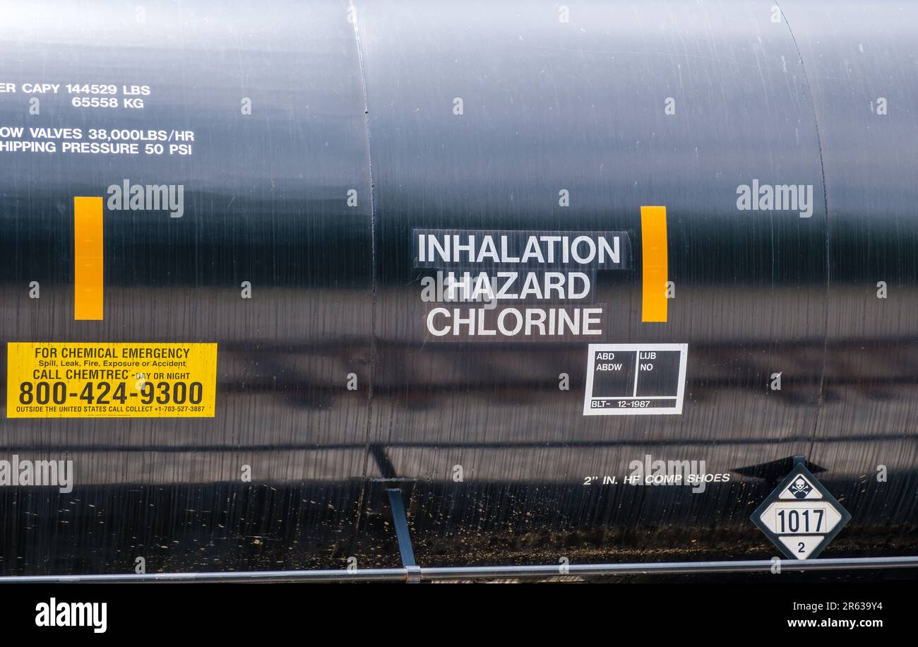 NEW ORLEANS, LA, USA - JUNE 2, 2023: Railroad tank car displaying 'Inhalation Hazard Chlorine' warning and an emergency number Stock Photo