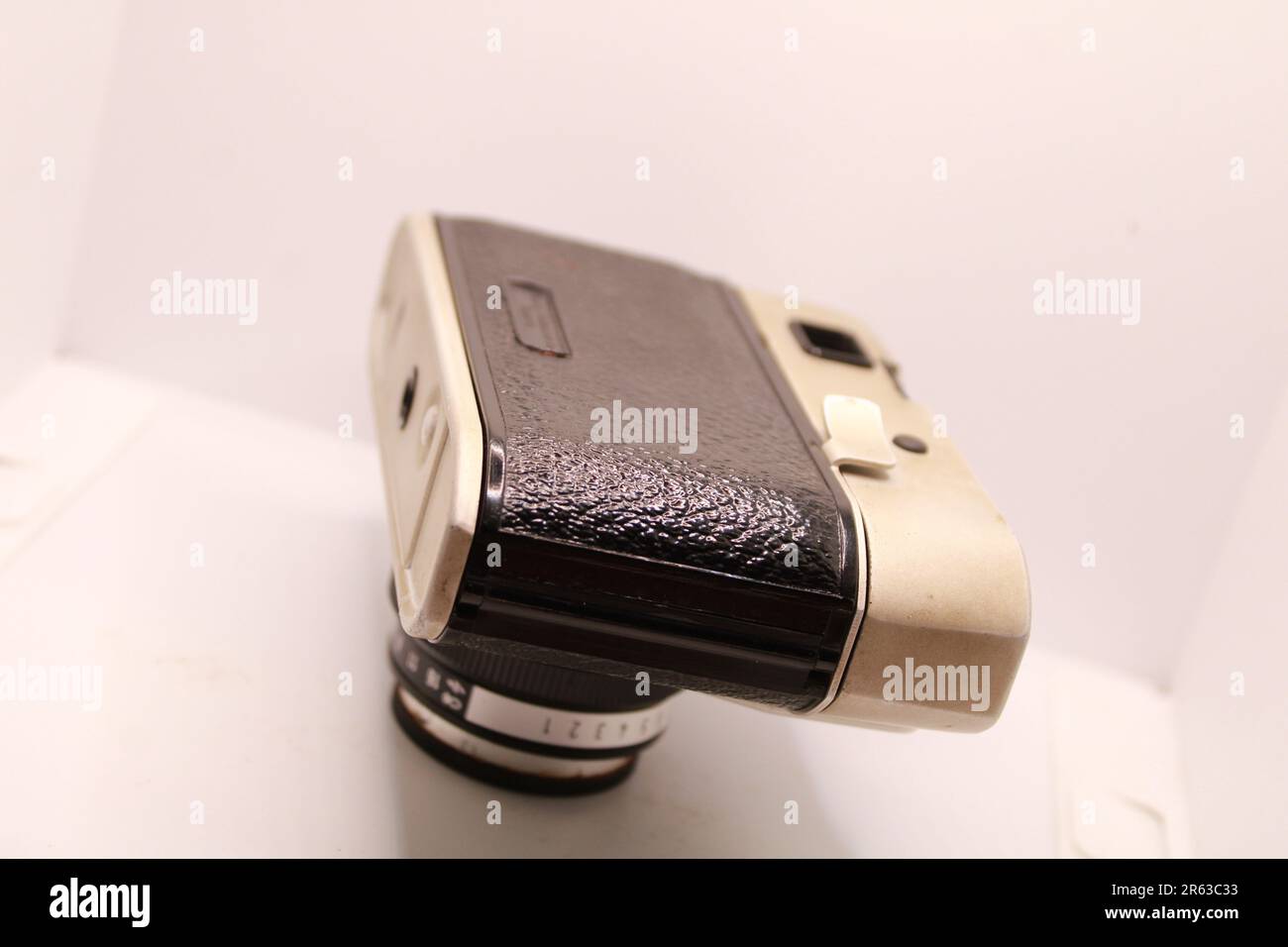 A very Old vintage black and white photography camera on White Background. Stock Photo