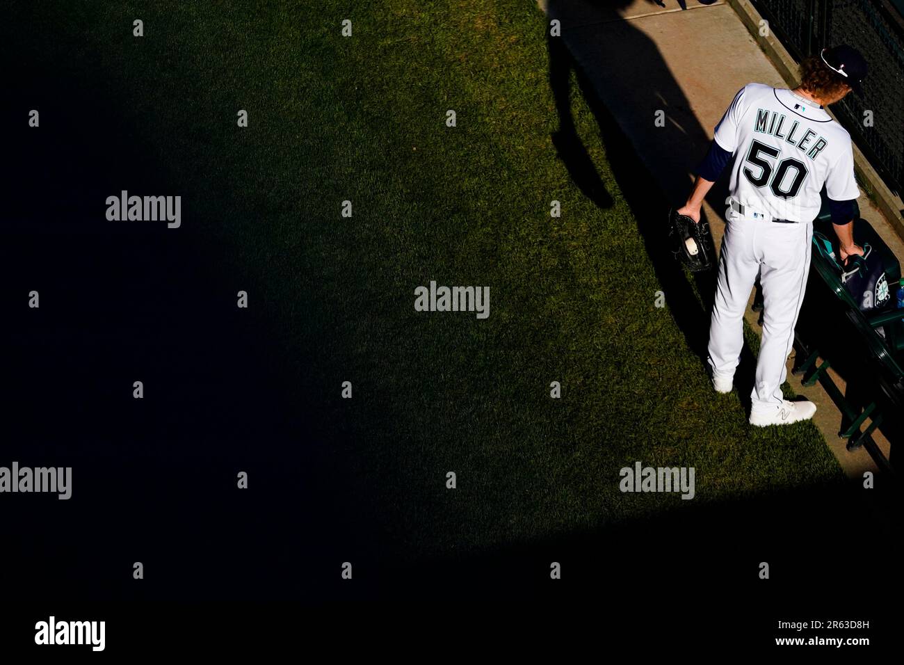 Seattle Mariners starting pitcher Bryce Miller walks in the bullpen