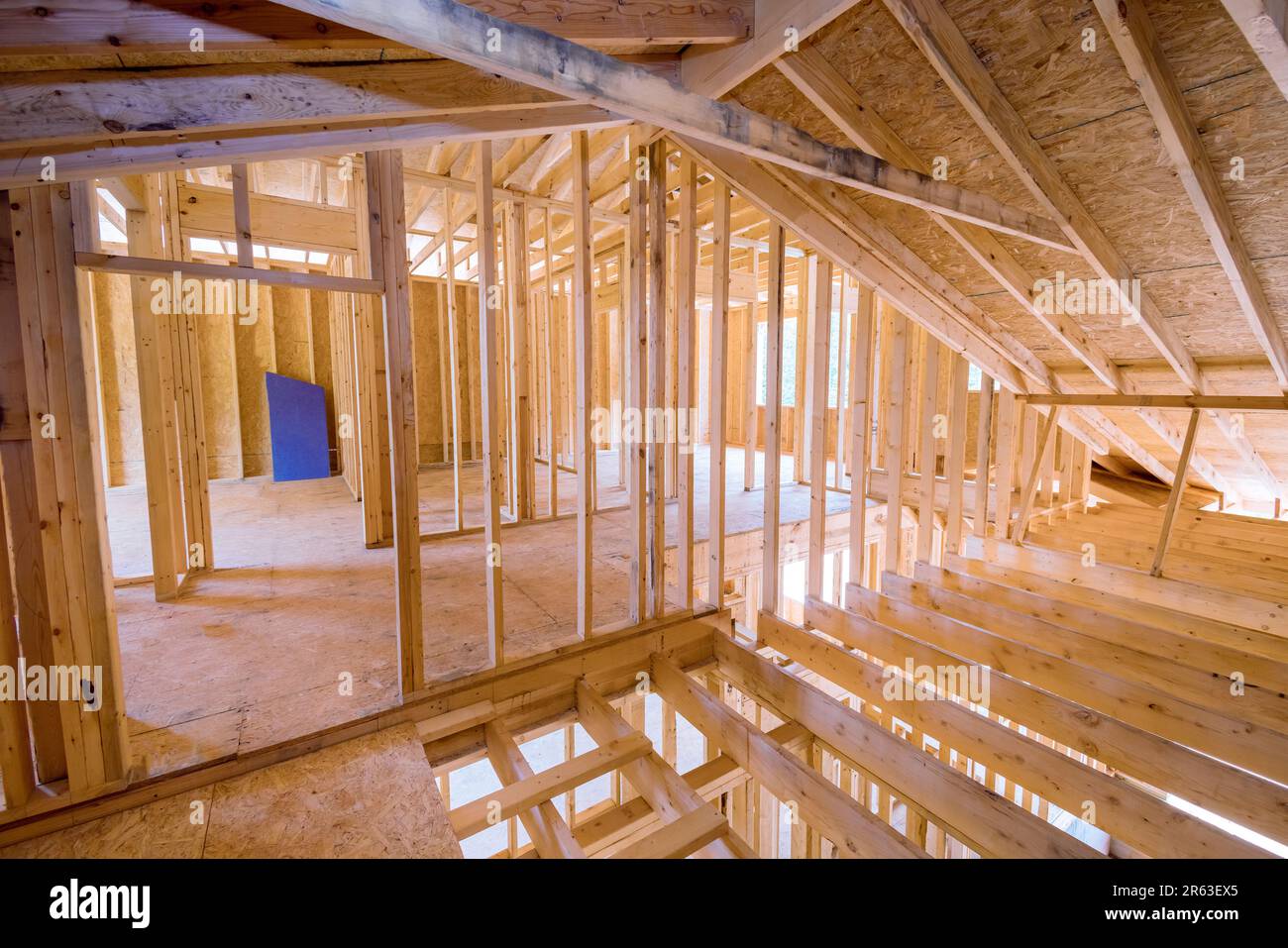 A inside frame support wooden beams under construction to new house