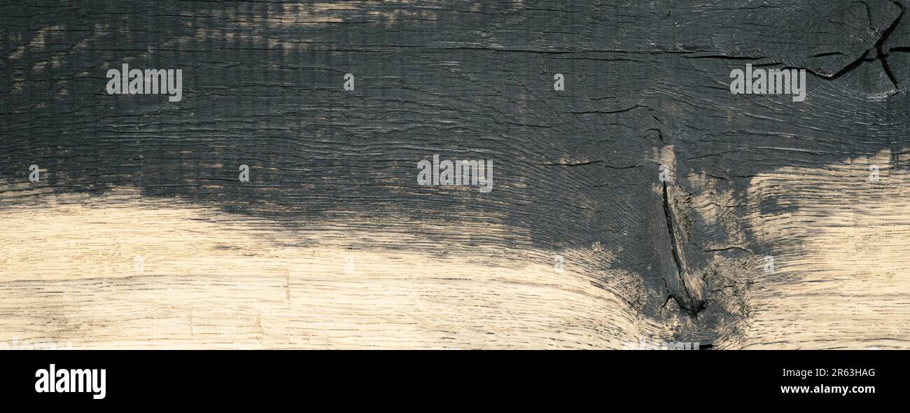 Plank Header Old rustic dark oak plank using as natural background or header with ...