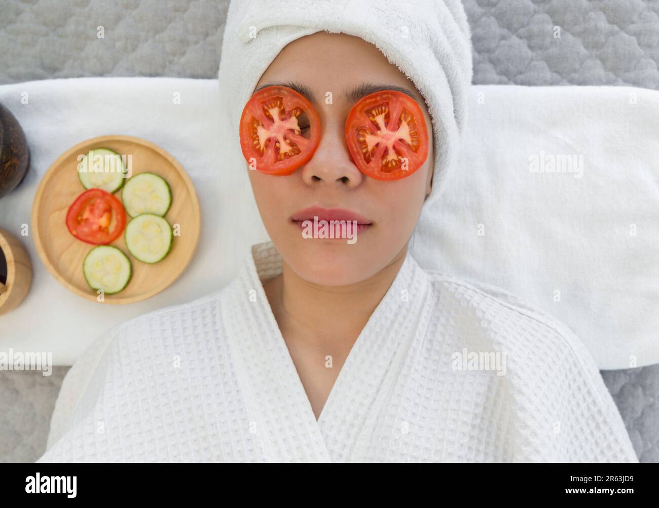 Woman covering face bed dressed hires stock photography and images Alamy