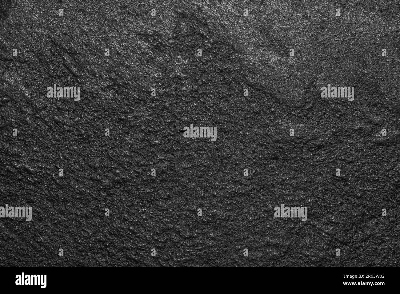 Black or dark gray rough grainy stone wall texture background Stock ...