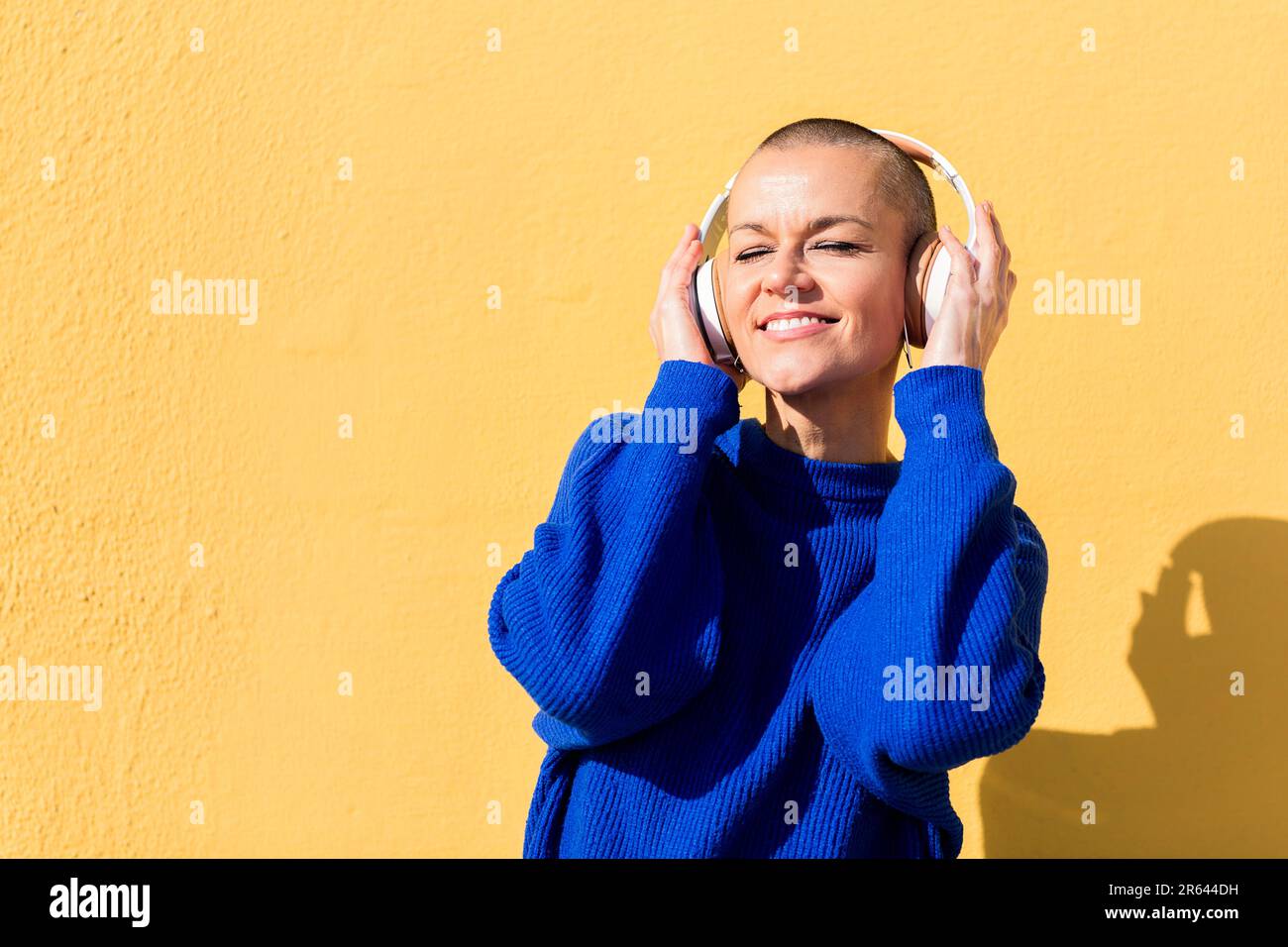 woman enjoying happy the music in her headphones Stock Photo