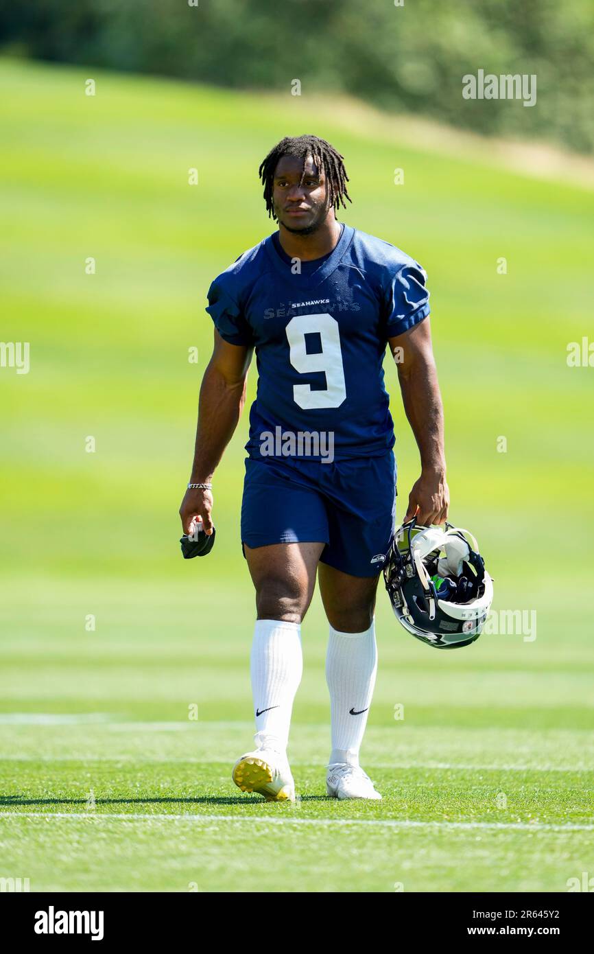 Seattle Seahawks running back Kenneth Walker III walks off
