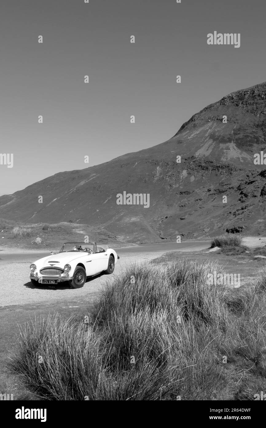1965 Austin Healey 3000 MKIII  on Newlands Hause Pass driving in the Lake District UK Stock Photo